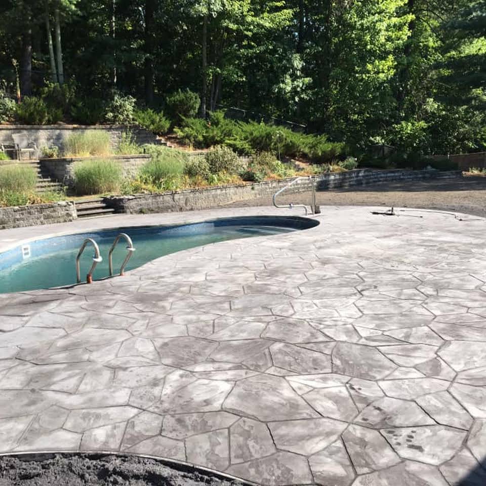 Add Some Decorative Concrete to Your Pool Yard